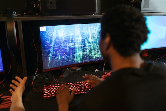 A man use a computer desktop in Sherwood